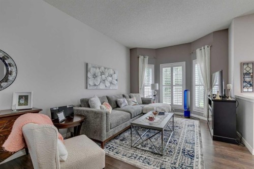 271 Tuscany Valley Drive Nw, Calgary, AB - Indoor Photo Showing Living Room