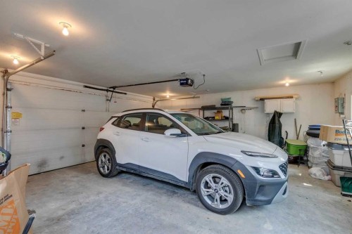 271 Tuscany Valley Drive Nw, Calgary, AB - Indoor Photo Showing Garage