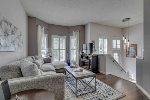 271 Tuscany Valley Drive Nw, Calgary, AB - Indoor Photo Showing Living Room