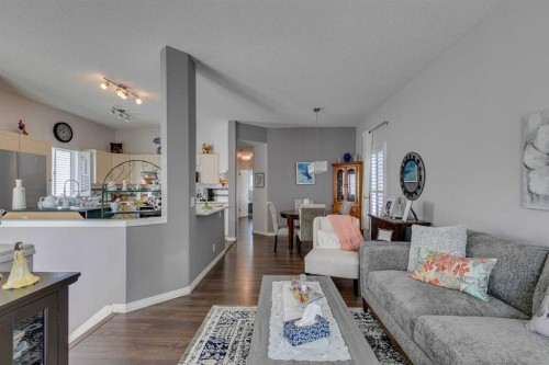 271 Tuscany Valley Drive Nw, Calgary, AB - Indoor Photo Showing Living Room
