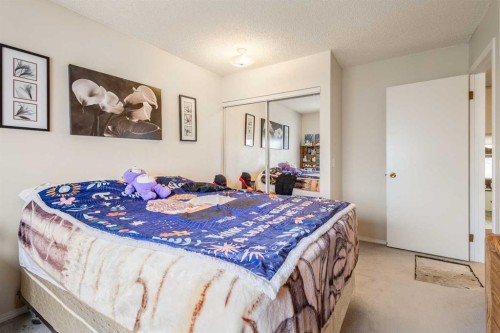 6496 54 Street Ne, Calgary, AB - Indoor Photo Showing Bedroom