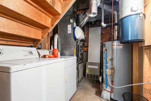 6496 54 Street Ne, Calgary, AB - Indoor Photo Showing Laundry Room