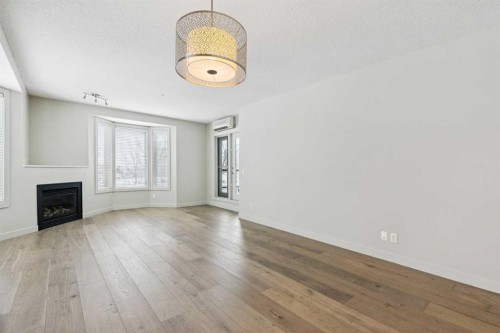 202-880 Centre Avenue Ne, Calgary, AB - Indoor With Fireplace