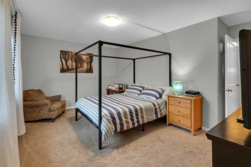 367 Fireside Place, Cochrane, AB - Indoor Photo Showing Bedroom
