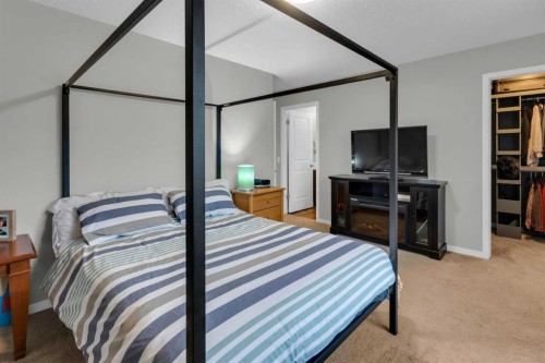 367 Fireside Place, Cochrane, AB - Indoor Photo Showing Bedroom