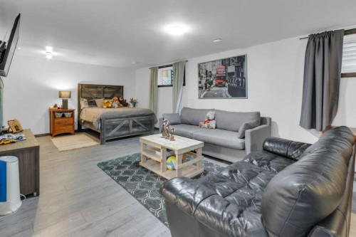 367 Fireside Place, Cochrane, AB - Indoor Photo Showing Living Room