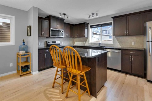 367 Fireside Place, Cochrane, AB - Indoor Photo Showing Kitchen With Stainless Steel Kitchen