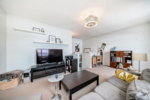 936 Copperfield Boulevard Se, Calgary, AB - Indoor Photo Showing Living Room