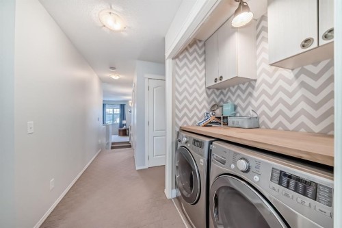 936 Copperfield Boulevard Se, Calgary, AB - Indoor Photo Showing Laundry Room