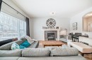 936 Copperfield Boulevard Se, Calgary, AB  - Indoor Photo Showing Living Room With Fireplace 