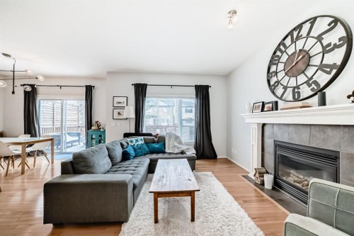 936 Copperfield Boulevard Se, Calgary, AB - Indoor Photo Showing Living Room With Fireplace