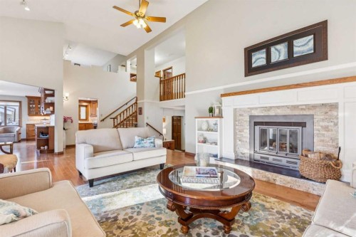 6 Glenbrook Crescent, Cochrane, AB - Indoor Photo Showing Living Room With Fireplace