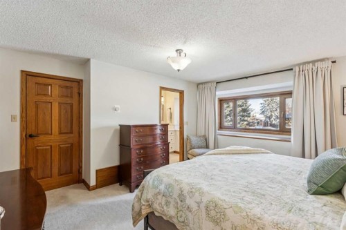 6 Glenbrook Crescent, Cochrane, AB - Indoor Photo Showing Bedroom