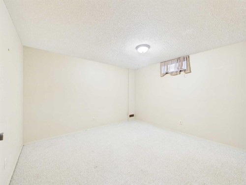 503 Dalcastle Mews Nw, Calgary, AB - Indoor Photo Showing Other Room