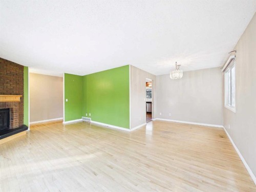 503 Dalcastle Mews Nw, Calgary, AB - Indoor With Fireplace