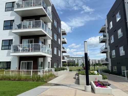 204-4150 Seton Drive Se, Calgary, AB - Outdoor With Balcony