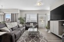 204-4150 Seton Drive Se, Calgary, AB  - Indoor Photo Showing Living Room 