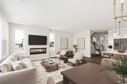 27 Setonvista Grove Se, Calgary, AB - Indoor Photo Showing Living Room With Fireplace