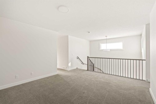 27 Setonvista Grove Se, Calgary, AB - Indoor Photo Showing Other Room