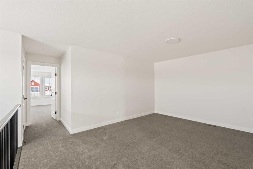 27 Setonvista Grove Se, Calgary, AB - Indoor Photo Showing Other Room