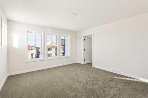 27 Setonvista Grove Se, Calgary, AB - Indoor Photo Showing Other Room