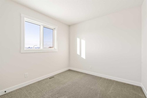 27 Setonvista Grove Se, Calgary, AB - Indoor Photo Showing Other Room