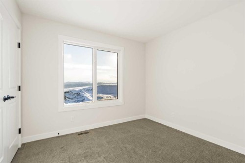 27 Setonvista Grove Se, Calgary, AB - Indoor Photo Showing Other Room