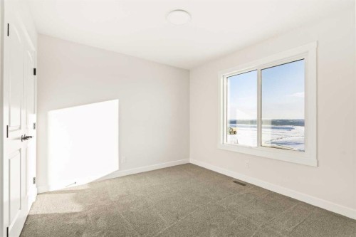 27 Setonvista Grove Se, Calgary, AB - Indoor Photo Showing Other Room