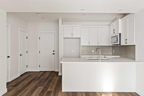 27 Setonvista Grove Se, Calgary, AB - Indoor Photo Showing Kitchen