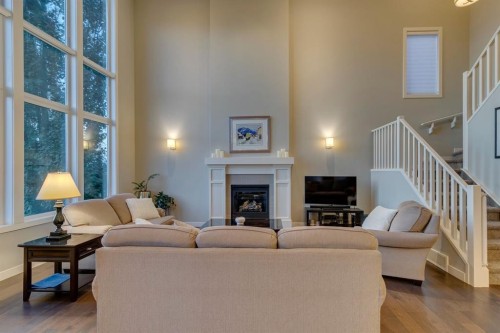 101 Cranarch Common Se, Calgary, AB - Indoor Photo Showing Living Room With Fireplace