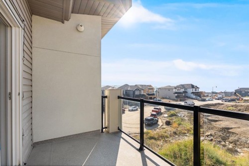91 Spring Creek Common Sw, Calgary, AB - Outdoor With Balcony