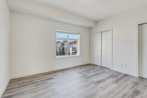 91 Spring Creek Common Sw, Calgary, AB - Indoor Photo Showing Other Room