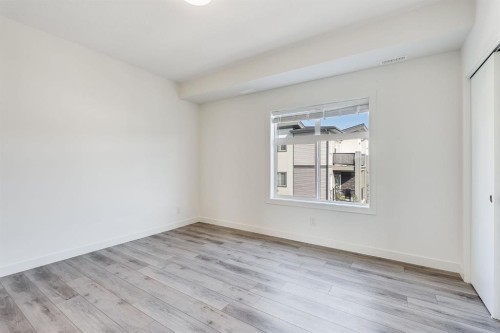 91 Spring Creek Common Sw, Calgary, AB - Indoor Photo Showing Other Room