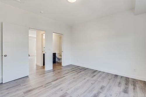 91 Spring Creek Common Sw, Calgary, AB - Indoor Photo Showing Other Room