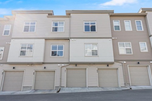 91 Spring Creek Common Sw, Calgary, AB - Outdoor With Facade
