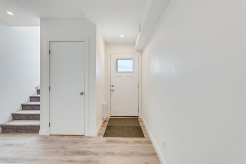 91 Spring Creek Common Sw, Calgary, AB - Indoor Photo Showing Other Room
