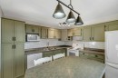 3404 35 Avenue Se, Calgary, AB  - Indoor Photo Showing Kitchen With Double Sink 