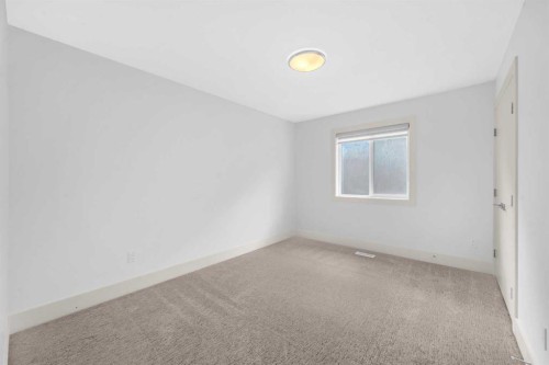 127 Evansview Road Nw, Calgary, AB - Indoor Photo Showing Other Room