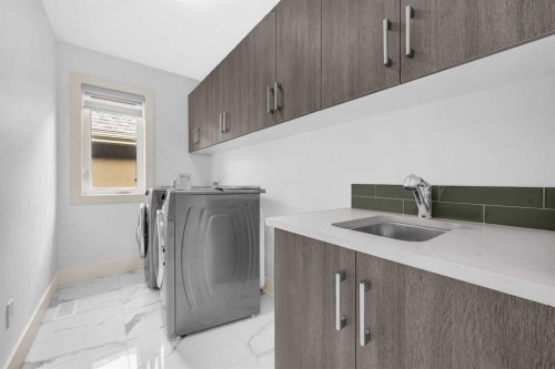 127 Evansview Road Nw, Calgary, AB - Indoor Photo Showing Laundry Room