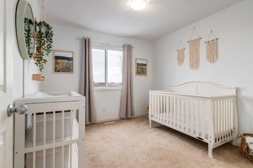 5 Cranford Place Se, Calgary, AB - Indoor Photo Showing Bedroom