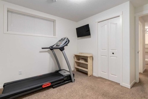 5 Cranford Place Se, Calgary, AB - Indoor Photo Showing Gym Room