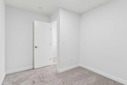 204-95 Saddlecrest Circle Ne, Calgary, AB - Indoor Photo Showing Other Room