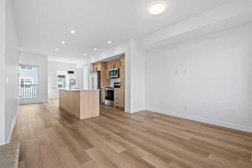 1007-25 Wildwoods Court Sw, Airdrie, AB - Indoor Photo Showing Kitchen