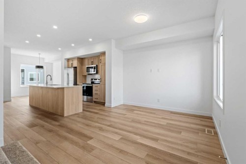 1007-25 Wildwoods Court Sw, Airdrie, AB - Indoor Photo Showing Kitchen