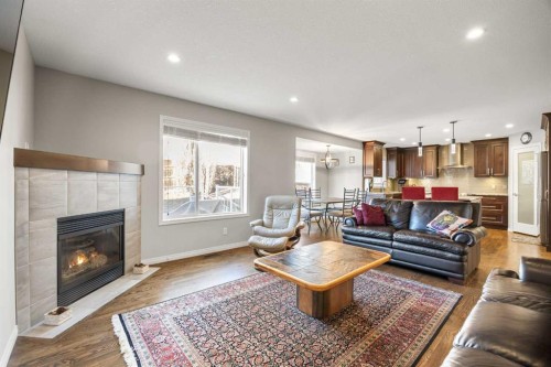 34 Edgeridge Mews Nw, Calgary, AB - Indoor Photo Showing Living Room With Fireplace