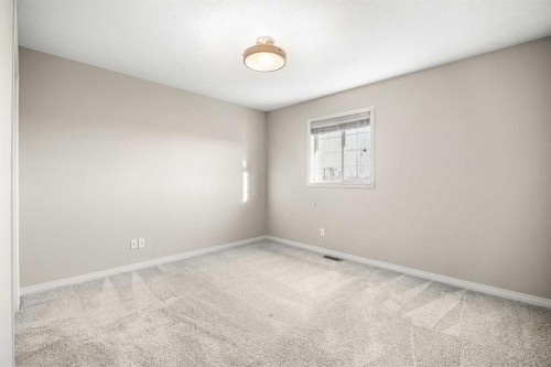 34 Edgeridge Mews Nw, Calgary, AB - Indoor Photo Showing Other Room