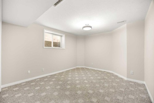 34 Edgeridge Mews Nw, Calgary, AB - Indoor Photo Showing Other Room
