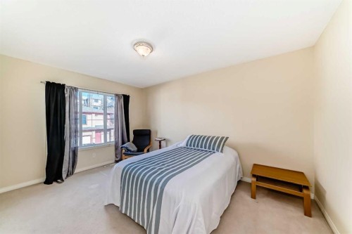 116 Hidden Creek Rise Nw, Calgary, AB - Indoor Photo Showing Bedroom