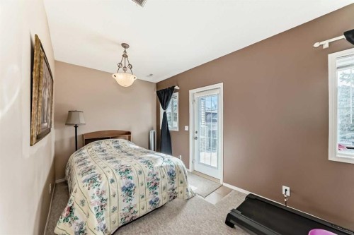 116 Hidden Creek Rise Nw, Calgary, AB - Indoor Photo Showing Bedroom