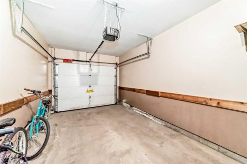 116 Hidden Creek Rise Nw, Calgary, AB - Indoor Photo Showing Garage